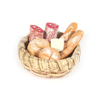 Cesto rotondo con pane, salame e formaggio